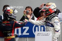 14.09.2008 Monza, Italy,  Sebastian Vettel (GER), Scuderia Toro Rosso wins, Robert Kubica (POL),  BMW Sauber F1 Team finishes 3rd - Formula 1 World Championship, Rd 14, Italian Grand Prix, Sunday Podium