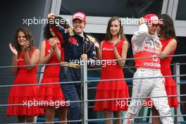 14.09.2008 Monza, Italy,  Sebastian Vettel (GER), Scuderia Toro Rosso, Heikki Kovalainen (FIN), McLaren Mercedes  - Formula 1 World Championship, Rd 14, Italian Grand Prix, Sunday Podium