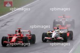 14.09.2008 Monza, Italy,  Kimi Raikkonen (FIN), Räikkönen, Scuderia Ferrari, Giancarlo Fisichella (ITA), Force India F1 Team  - Formula 1 World Championship, Rd 14, Italian Grand Prix, Sunday Race