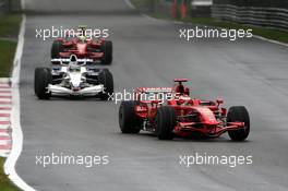 14.09.2008 Monza, Italy,  Kimi Raikkonen (FIN), Räikkönen, Scuderia Ferrari, F2008 leads Nick Heidfeld (GER), BMW Sauber F1 Team, F1.08 - Formula 1 World Championship, Rd 14, Italian Grand Prix, Sunday Race