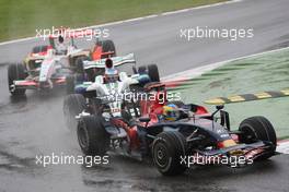 14.09.2008 Monza, Italy,  Sebastian Bourdais (FRA), Scuderia Toro Rosso, STR03 leads Jenson Button (GBR), Honda Racing F1 Team, RA108 - Formula 1 World Championship, Rd 14, Italian Grand Prix, Sunday Race
