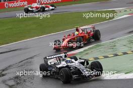 14.09.2008 Monza, Italy,  Nico Rosberg (GER), WilliamsF1 Team, FW30 leads Felipe Massa (BRA), Scuderia Ferrari, F2008 - Formula 1 World Championship, Rd 14, Italian Grand Prix, Sunday Race