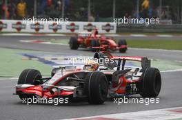 14.09.2008 Monza, Italy,  Lewis Hamilton (GBR), McLaren Mercedes, MP4-23 and Kimi Raikkonen (FIN), Räikkönen, Scuderia Ferrari, F2008 - Formula 1 World Championship, Rd 14, Italian Grand Prix, Sunday Race