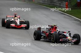14.09.2008 Monza, Italy,  Sebastian Vettel (GER), Scuderia Toro Rosso, STR03 leads Lewis Hamilton (GBR), McLaren Mercedes, MP4-23 - Formula 1 World Championship, Rd 14, Italian Grand Prix, Sunday Race