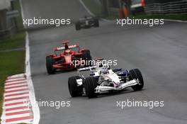 14.09.2008 Monza, Italy,  Nick Heidfeld (GER), BMW Sauber F1 Team, F1.08 leads Kimi Raikkonen (FIN), Räikkönen, Scuderia Ferrari, F2008 - Formula 1 World Championship, Rd 14, Italian Grand Prix, Sunday Race