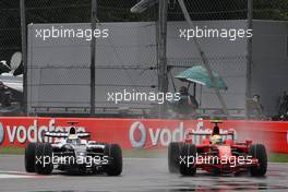 14.09.2008 Monza, Italy,  Felipe Massa (BRA), Scuderia Ferrari, F2008 overtakes Nico Rosberg (GER), WilliamsF1 Team, FW30 - Formula 1 World Championship, Rd 14, Italian Grand Prix, Sunday Race