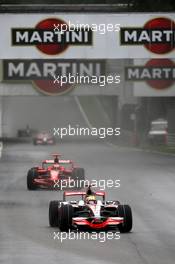 14.09.2008 Monza, Italy,  Lewis Hamilton (GBR), McLaren Mercedes leads Kimi Raikkonen (FIN), Räikkönen, Scuderia Ferrari - Formula 1 World Championship, Rd 14, Italian Grand Prix, Sunday Race