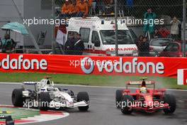 14.09.2008 Monza, Italy,  Felipe Massa (BRA), Scuderia Ferrari, F2008 overtakes Nick Heidfeld (GER), BMW Sauber F1 Team, F1.08 - Formula 1 World Championship, Rd 14, Italian Grand Prix, Sunday Race