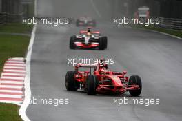 14.09.2008 Monza, Italy,  Kimi Raikkonen (FIN), Räikkönen, Scuderia Ferrari, F2008 leads Lewis Hamilton (GBR), McLaren Mercedes, MP4-23 - Formula 1 World Championship, Rd 14, Italian Grand Prix, Sunday Race