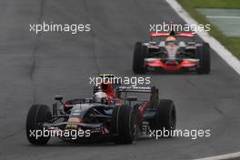 14.09.2008 Monza, Italy,  Sebastian Vettel (GER), Scuderia Toro Rosso, STR03 leads Lewis Hamilton (GBR), McLaren Mercedes, MP4-23 - Formula 1 World Championship, Rd 14, Italian Grand Prix, Sunday Race