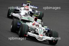 12.10.2008 Gotemba, Japan,  Rubens Barrichello (BRA), Honda Racing F1 Team, RA108 leads Robert Kubica (POL), BMW Sauber F1 Team, F1.08 - Formula 1 World Championship, Rd 16, Japanese Grand Prix, Sunday Race