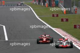 12.10.2008 Gotemba, Japan,  Kimi Raikkonen (FIN), Räikkönen, Scuderia Ferrari, Heikki Kovalainen (FIN), McLaren Mercedes  - Formula 1 World Championship, Rd 16, Japanese Grand Prix, Sunday Race
