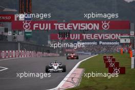 12.10.2008 Gotemba, Japan,  Robert Kubica (POL), BMW Sauber F1 Team, Kimi Raikkonen (FIN), Räikkönen, Scuderia Ferrari  - Formula 1 World Championship, Rd 16, Japanese Grand Prix, Sunday Race