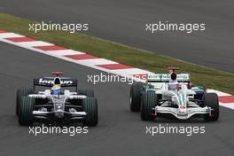 12.10.2008 Gotemba, Japan,  Nico Rosberg (GER), WilliamsF1 Team, FW30 and Jenson Button (GBR), Honda Racing F1 Team, RA108 - Formula 1 World Championship, Rd 16, Japanese Grand Prix, Sunday Race