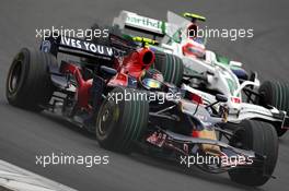 12.10.2008 Gotemba, Japan,  Sebastian Vettel (GER), Scuderia Toro Rosso, STR03 leads Rubens Barrichello (BRA), Honda Racing F1 Team, RA108 - Formula 1 World Championship, Rd 16, Japanese Grand Prix, Sunday Race
