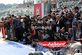 11.10.2008 Gotemba, Japan,  Photographers at Parc Ferme - Formula 1 World Championship, Rd 16, Japanese Grand Prix, Saturday Qualifying