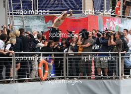 25.05.2008 Monte Carlo, Monaco,  Sebastian Vettel (GER), Scuderia Toro Rosso, jumps off the Red Bull Energy Station into the harbour / port - Formula 1 World Championship, Rd 6, Monaco Grand Prix, Sunday Podium