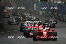 25.05.2008 Monte Carlo, Monaco,  Start, Felipe Massa (BRA), Scuderia Ferrari, F2008, leads Lewis Hamilton (GBR), McLaren Mercedes, MP4-23 - Formula 1 World Championship, Rd 6, Monaco Grand Prix, Sunday Race