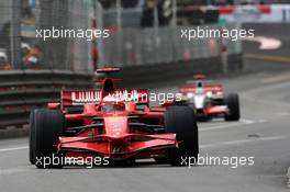 25.05.2008 Monte Carlo, Monaco,  Heikki Kovalainen (FIN), McLaren Mercedes leads Adrian Sutil (GER), Force India F1 Team - Formula 1 World Championship, Rd 6, Monaco Grand Prix, Sunday Race