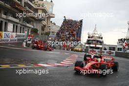 25.05.2008 Monte Carlo, Monaco,  Start, Felipe Massa (BRA), Scuderia Ferrari, F2008, leads Lewis Hamilton (GBR), McLaren Mercedes, MP4-23 - Formula 1 World Championship, Rd 6, Monaco Grand Prix, Sunday Race