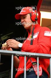 24.05.2008 Monte Carlo, Monaco,  Michael Schumacher (GER), Test Driver, Scuderia Ferrari having something to eat during the session - Formula 1 World Championship, Rd 6, Monaco Grand Prix, Saturday Practice