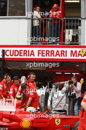 24.05.2008 Monte Carlo, Monaco,  Michael Schumacher (GER), Test Driver, Scuderia Ferrari watches over Felipe Massa (BRA), Scuderia Ferrari - Formula 1 World Championship, Rd 6, Monaco Grand Prix, Saturday Practice