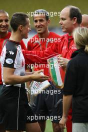 20.05.2008 Monte Carlo, Monaco,  Michael Schumacher (GER), Test Driver, Scuderia Ferrari and Prince Albert II of Monaco -  Star Team vs Nazionale Piloti, Charity Football Match, Monaco, Stade Louis II, Monaco