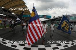 23.03.2008 Kuala Lumpur, Malaysia,  Grid Girl with the Malaysian Flag - Formula 1 World Championship, Rd 2, Malaysian Grand Prix, Sunday Pre-Race Grid
