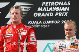 23.03.2008 Kuala Lumpur, Malaysia,  Kimi Raikkonen (FIN), Räikkönen, Scuderia Ferrari, Heikki Kovalainen (FIN), McLaren Mercedes - Formula 1 World Championship, Rd 2, Malaysian Grand Prix, Sunday Podium