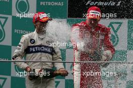 23.03.2008 Kuala Lumpur, Malaysia,  Kimi Raikkonen (FIN), Räikkönen, Scuderia Ferrari and Robert Kubica (POL),  BMW Sauber F1 Team - Formula 1 World Championship, Rd 2, Malaysian Grand Prix, Sunday Podium