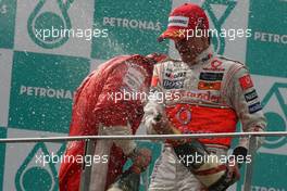 23.03.2008 Kuala Lumpur, Malaysia,  Heikki Kovalainen (FIN), McLaren Mercedes - Formula 1 World Championship, Rd 2, Malaysian Grand Prix, Sunday Podium