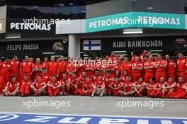 23.03.2008 Kuala Lumpur, Malaysia,  Ferrari celebration, Kimi Raikkonen (FIN), Räikkönen, Scuderia Ferrari, Chris Dyer (AUS), Scuderia Ferrari, Track Engineer of Kimi Raikkonen (FIN)- Formula 1 World Championship, Rd 2, Malaysian Grand Prix, Sunday Podium