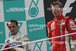 23.03.2008 Kuala Lumpur, Malaysia,  Winner, 1st, Kimi Raikkonen (FIN), Räikkönen, Scuderia Ferrari and Robert Kubica (POL),  BMW Sauber F1 Team - Formula 1 World Championship, Rd 2, Malaysian Grand Prix, Sunday Podium