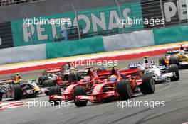 23.03.2008 Kuala Lumpur, Malaysia,  Start, 1st, Felipe Massa (BRA), Scuderia Ferrari, F2008 and Kimi Raikkonen (FIN), Räikkönen, Scuderia Ferrari, F2008 - Formula 1 World Championship, Rd 2, Malaysian Grand Prix, Sunday Race