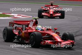 23.03.2008 Kuala Lumpur, Malaysia,  Felipe Massa (BRA), Scuderia Ferrari, Kimi Raikkonen (FIN), Räikkönen, Scuderia Ferrari - Formula 1 World Championship, Rd 2, Malaysian Grand Prix, Sunday Race