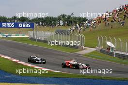23.03.2008 Kuala Lumpur, Malaysia,  Giancarlo Fisichella (ITA), Force India F1 Team, Nico Rosberg (GER), WilliamsF1 Team - Formula 1 World Championship, Rd 2, Malaysian Grand Prix, Sunday Race