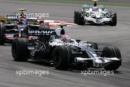 23.03.2008 Kuala Lumpur, Malaysia,  Kazuki Nakajima (JPN), Williams F1 Team, Sebastian Vettel (GER), Scuderia Toro Rosso - Formula 1 World Championship, Rd 2, Malaysian Grand Prix, Sunday Race