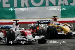 23.03.2008 Kuala Lumpur, Malaysia,  Jarno Trulli (ITA), Toyota Racing, TF108 and Nelson Piquet Jr (BRA), Renault F1 Team, R28 - Formula 1 World Championship, Rd 2, Malaysian Grand Prix, Sunday Race