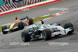 23.03.2008 Kuala Lumpur, Malaysia,  Jenson Button (GBR), Honda Racing F1 Team, RA108 and Nelson Piquet Jr (BRA), Renault F1 Team, R28 - Formula 1 World Championship, Rd 2, Malaysian Grand Prix, Sunday Race