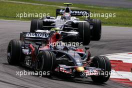 23.03.2008 Kuala Lumpur, Malaysia,  Sebastian Vettel (GER), Scuderia Toro Rosso, Kazuki Nakajima (JPN), Williams F1 Team - Formula 1 World Championship, Rd 2, Malaysian Grand Prix, Sunday Race