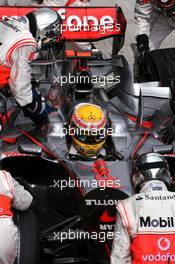 23.03.2008 Kuala Lumpur, Malaysia,  Lewis Hamilton (GBR), McLaren Mercedes during pitstop - Formula 1 World Championship, Rd 2, Malaysian Grand Prix, Sunday Race