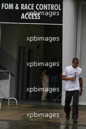 22.03.2008 Kuala Lumpur, Malaysia,  Lewis Hamilton (GBR), McLaren Mercedes, exits a meeting at race control - Formula 1 World Championship, Rd 2, Malaysian Grand Prix, Saturday