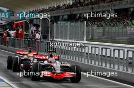 22.03.2008 Kuala Lumpur, Malaysia,  Heikki Kovalainen (FIN), McLaren Mercedes and Lewis Hamilton (GBR), McLaren Mercedes - Formula 1 World Championship, Rd 2, Malaysian Grand Prix, Saturday Qualifying