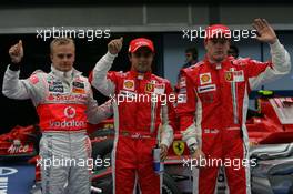 22.03.2008 Kuala Lumpur, Malaysia,  1st, Felipe Massa (BRA), Scuderia Ferrari, 2nd, Kimi Raikkonen (FIN), Räikkönen, Scuderia Ferrari, 3rd, Heikki Kovalainen (FIN), McLaren Mercedes - Formula 1 World Championship, Rd 2, Malaysian Grand Prix, Saturday Qualifying
