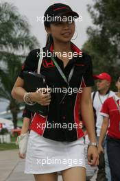 20.03.2008 Kuala Lumpur, Malaysia,  A girl in the paddock - Formula 1 World Championship, Rd 2, Malaysian Grand Prix, Thursday