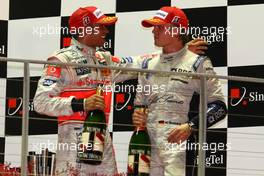 28.09.2008 Singapore City, Singapore,  3rd place Lewis Hamilton (GBR), McLaren Mercedes and 2nd place Nico Rosberg (GER), WilliamsF1 Team - Formula 1 World Championship, Rd 15, Singapore Grand Prix, Sunday Podium