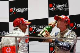 28.09.2008 Singapore City, Singapore,  3rd place Lewis Hamilton (GBR), McLaren Mercedes and 2nd place Nico Rosberg (GER), WilliamsF1 Team - Formula 1 World Championship, Rd 15, Singapore Grand Prix, Sunday Podium