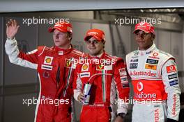 27.09.2008 Singapore City, Singapore,  3rd, Kimi Raikkonen (FIN), Räikkönen, Scuderia Ferrari, 1st, Felipe Massa (BRA), Scuderia Ferrari and 2nd, Lewis Hamilton (GBR), McLaren Mercedes - Formula 1 World Championship, Rd 15, Singapore Grand Prix, Saturday Qualifying