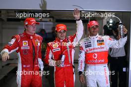 27.09.2008 Singapore City, Singapore,  Kimi Raikkonen (FIN), Räikkönen, Scuderia Ferrari, Felipe Massa (BRA), Scuderia Ferrari, Lewis Hamilton (GBR), McLaren Mercedes  - Formula 1 World Championship, Rd 15, Singapore Grand Prix, Saturday Qualifying