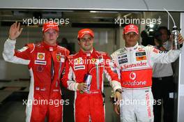 27.09.2008 Singapore City, Singapore,  Kimi Raikkonen (FIN), Räikkönen, Scuderia Ferrari, Felipe Massa (BRA), Scuderia Ferrari, Lewis Hamilton (GBR), McLaren Mercedes  - Formula 1 World Championship, Rd 15, Singapore Grand Prix, Saturday Qualifying